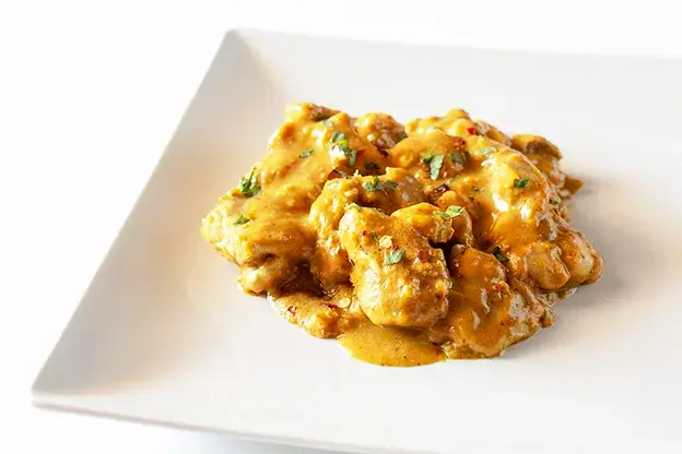 Pollo al curry con leche de coco a domicilio